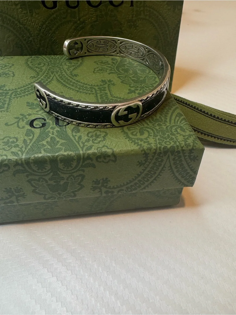 Gucci Silver-Tone Cuff with Black Inlay and Interlocking G Detail